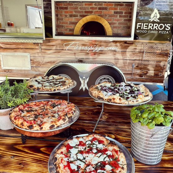 many pizzas in front of our trailer